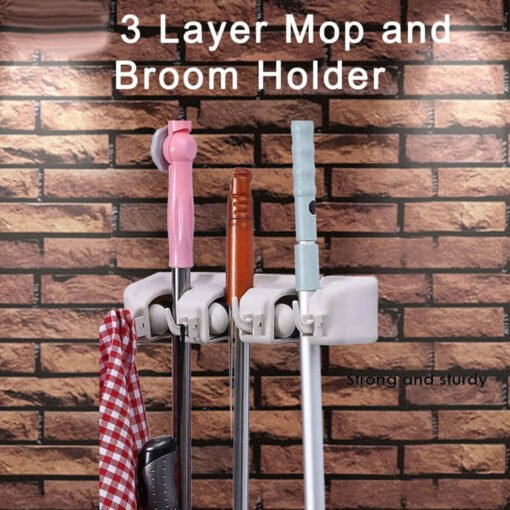 Wall mounted mop and broom holder