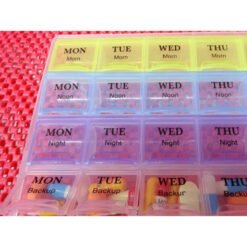medicine tabletes in pill box organizer storage